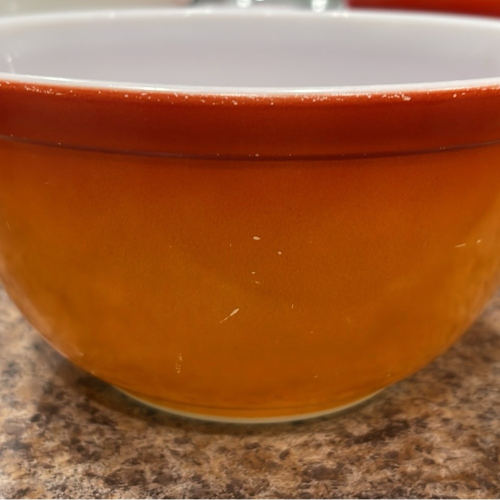 Vintage PYREX orange ombré PYREX mixing bowl. 1.5 qt. Has some light scratches